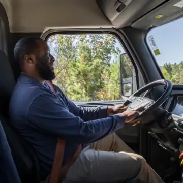 Picture of man driving a semi-truck