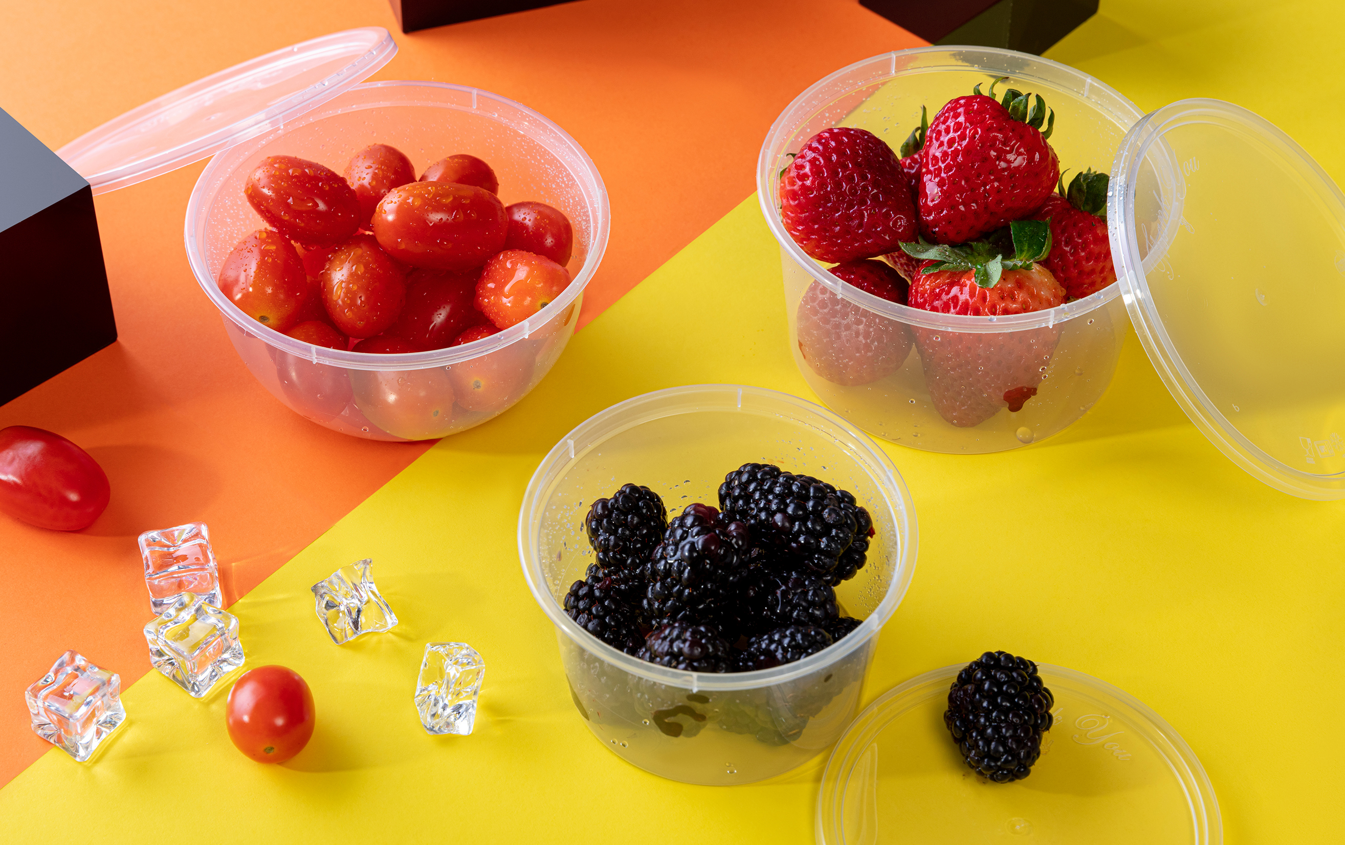 Photo of fruits and vegetables in clear plastic containers